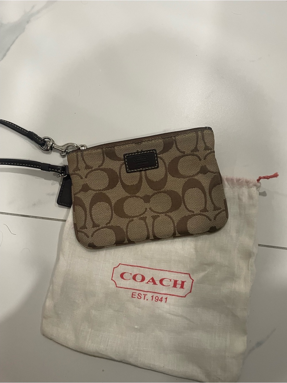 Coach Brown Signature Canvas Wristlet with Dark Strap